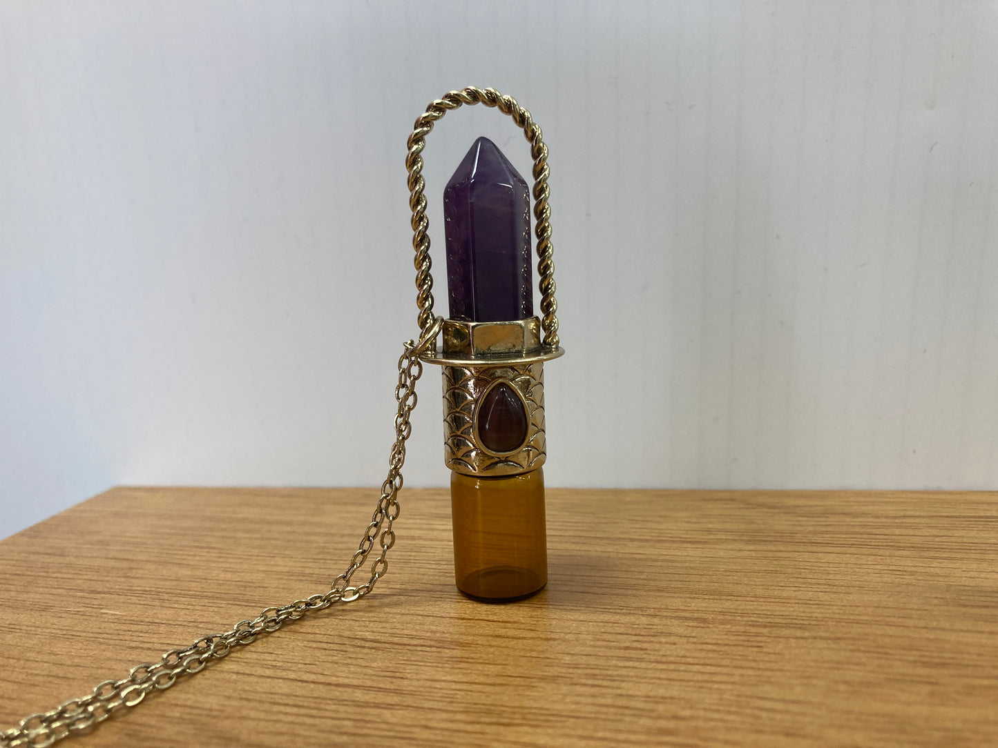 Perfume bottle necklace