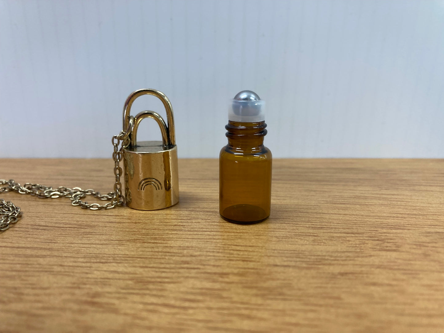 Perfume bottle necklace