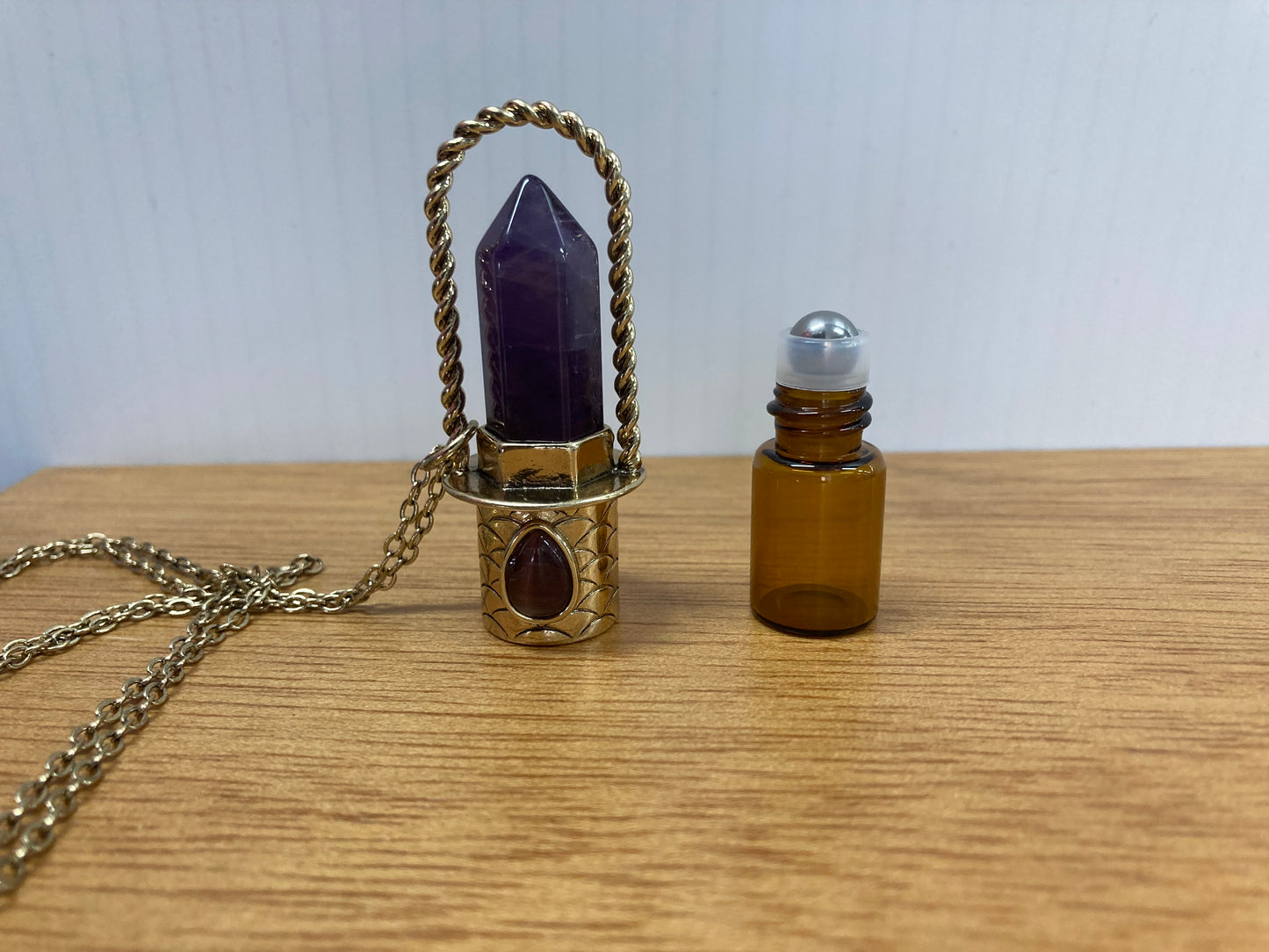 Perfume bottle necklace
